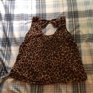 Cheetah print top with bow on the back.